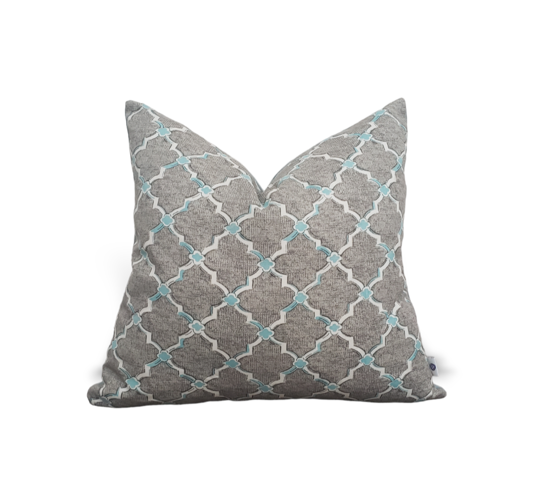 Our unique Aqua Trellis Designer Throw Pillow adds a modern touch to your home with its geometric print and refreshing aqua color. Crafted to be used indoors or outdoors, this stylish coastal-themed cushion cover brings a touch of luxury to any living space. Add a delightful design accent to your home with this designer pillow cover!