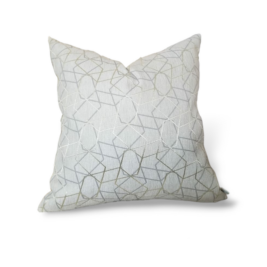 Add a luxurious touch to your décor with this designer throw pillow. Adorned with a beautiful gold geometric design, the handmade cushion cover is crafted from a unique designer fabric, making it both luxurious and limited edition. Let this one-of-a-kind accent piece bring a hint of glamour to your space! Highlights  Includes Pillow Cover and Polyfill Insert  20x20 in Knives Edge .  Free shipping to the USA, Canada, UK, Caribbean and Jamaica