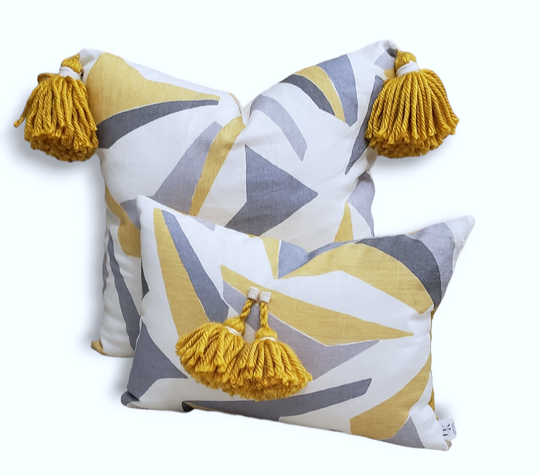 Experience luxury with this stunning throw pillow cover! Its Thom Filicia Kravet fabric, gold tassel accent, and invisible zipper make it the perfect addition to any room. Add a touch of sophistication and elegance to your decor today!