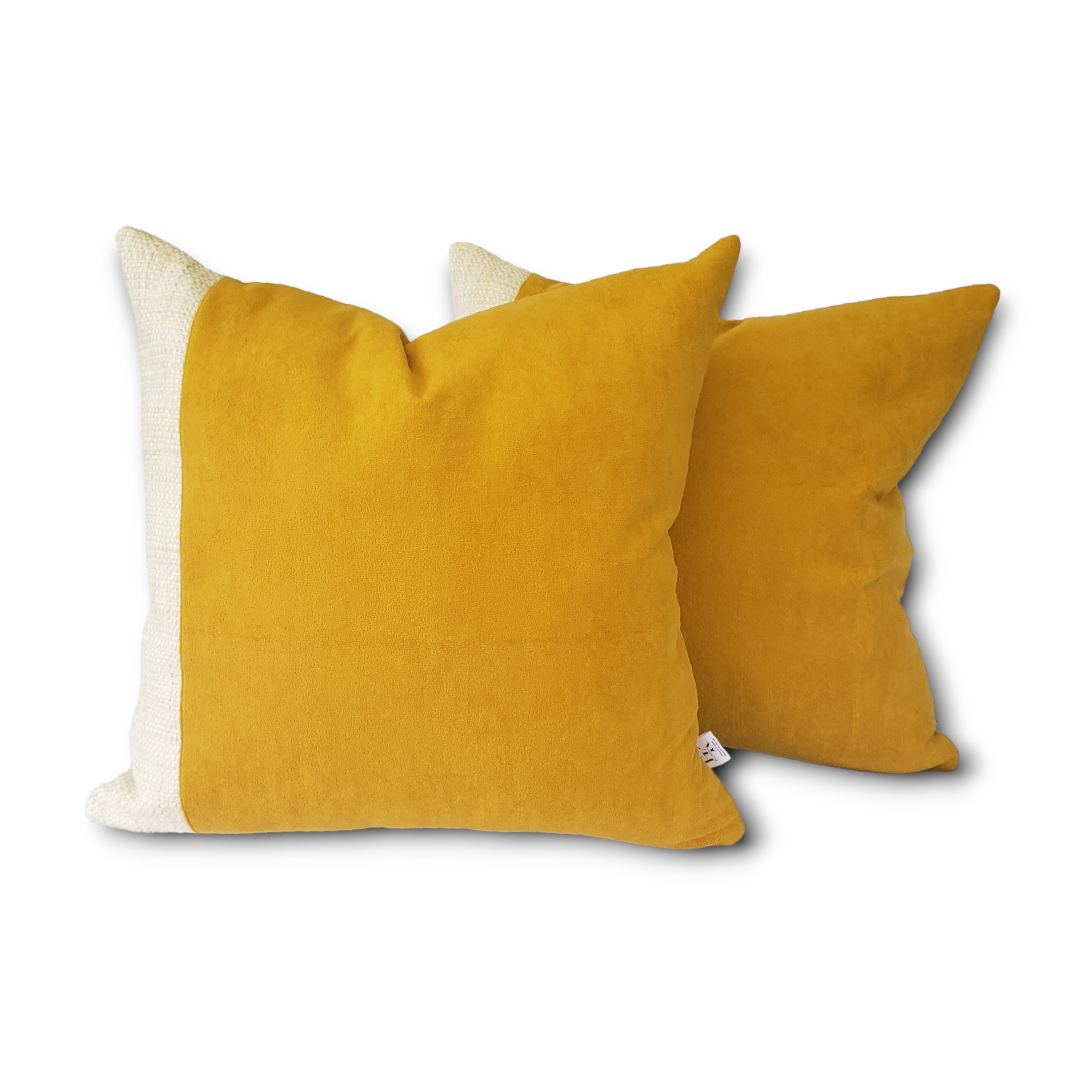 Elevate your home decor with our Fiokim Mustard Deluxe Square Pillow Cover. Crafted with luxurious mustard suede-like fabric, this designer pillow features a sophisticated woven ivory and beige design. Perfect for your sofa or bedroom, its matching reverse and double stitched, sealed edges add a touch of elegance. The invisible zipper ensures a seamless and polished look.