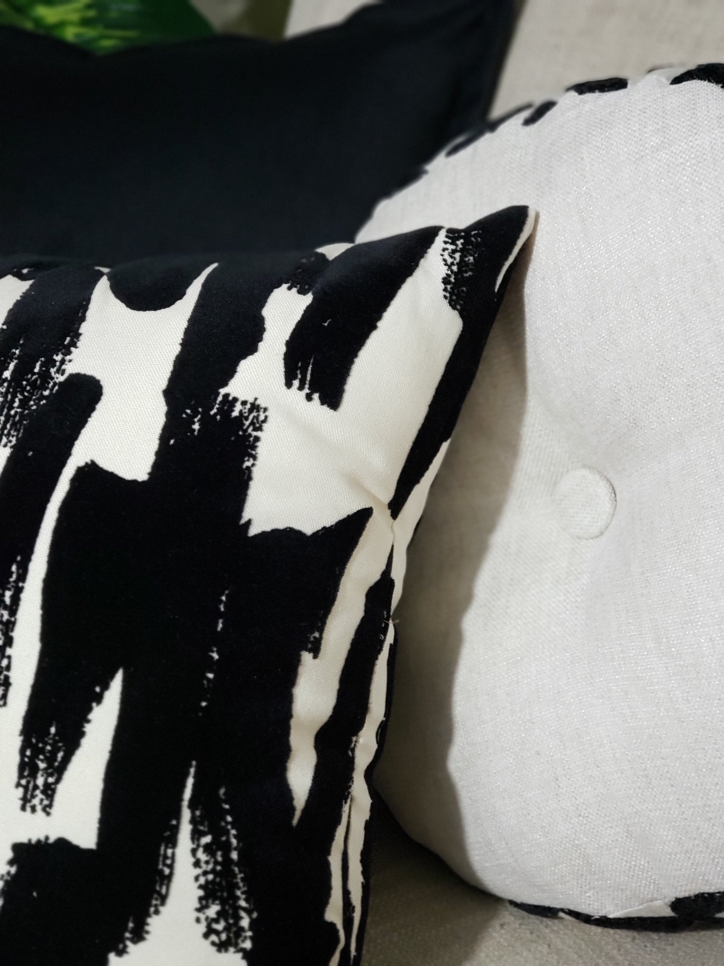Janaya Opulent Strokes Black and White Designer Decorative Pillow Covers.Elevate your home decor with the Janaya Opulent Strokes Black and White Designer Decorative Pillow Covers. Handmade with designer textured velvet fabric, these covers boast bold black brush strokes for a timeless touch. Make a statement in any room with these daring covers.
