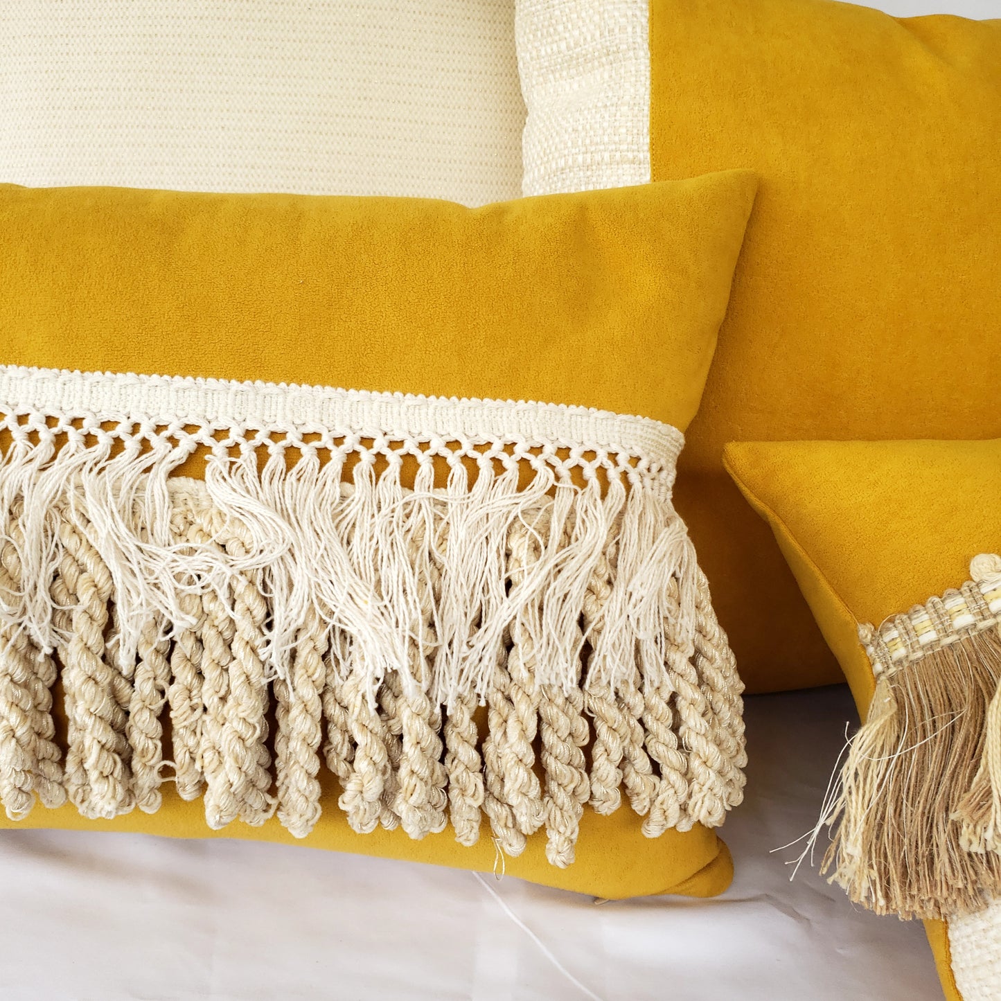 Experience the ultimate luxury with our Fiokim Mustard Deluxe tassels Lumbar Pillow Cover. Made from a soft, suede-like designer fabric in striking mustard yellow, this reversible cushion cover will add a touch of elegance to any room. The double-stitched and sealed edges ensure durability and the ivory and beige tassel accent adds a charming touch. Elevate your home decor with our must-have reversible lumbar pillow cover.
Advenique Home Decor pillows and throws