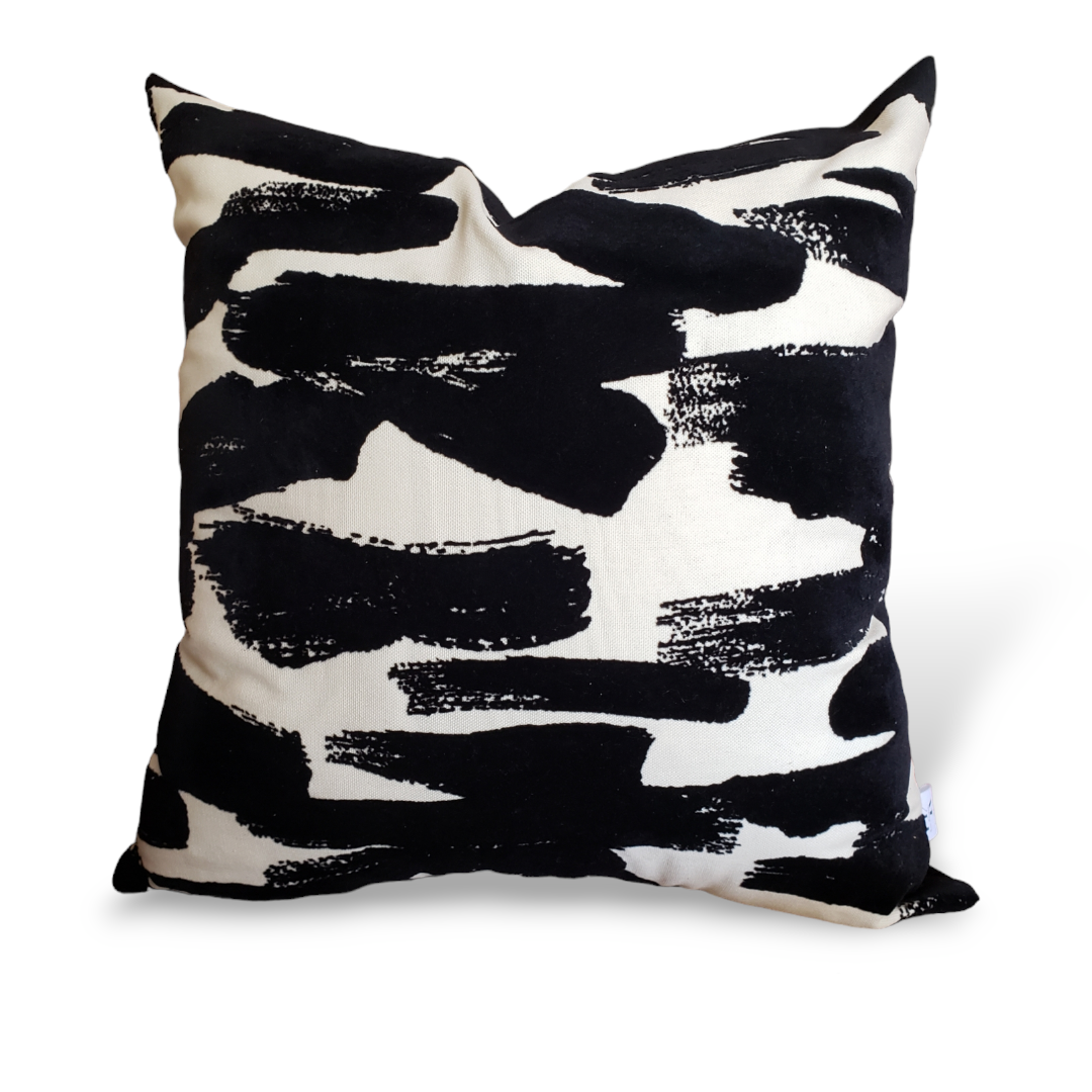 Janaya Opulent Strokes Black and White Designer Decorative Pillow Covers.Elevate your home decor with the Janaya Opulent Strokes Black and White Designer Decorative Pillow Covers. Handmade with designer textured velvet fabric, these covers boast bold black brush strokes for a timeless touch. Make a statement in any room with these daring covers.