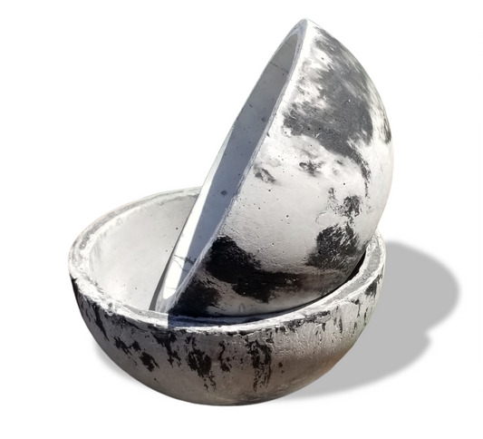 Discover a perfect combination of modern elegance and organic texture with this handmade distressed cement bowl. Offered in colors of black, white, gray, and marble, each high-end planter features unique designs crafted by Fiona Kimberly Design. Whether you're looking for a textured or smooth design with gold accents, this durable cement planter is sure to beautify your home or office. Add a touch of luxury to your space with this exquisite succulent planter.