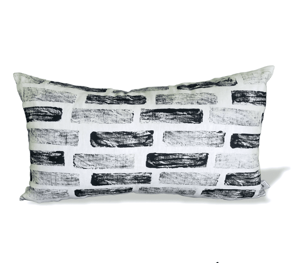 Luxury decorative pillow cushions now on sale.  Get the best high end throw pillows at advenique home decor.  Shop now and save on our Lumbar Geometric accent black and white pillow cushion.