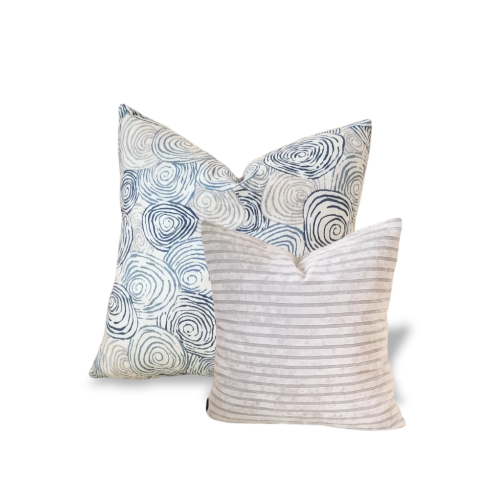 This Kravet Spiro River Decorative Designer Throw Pillow is the perfect way to add a touch of luxury to any room. This cushion cover features Jeffrey Alan Marks' Waterside fabric making it a beautiful and durable piece. The subtle blues, greys, of the fabric are sure to bring a sense of calm and relaxation to any home. Bring a touch of sophistication to your space with this stunning designer throw pillow.  International Shipping to the USA, Canada, UK, Europe, Jamaica & Caribbean.